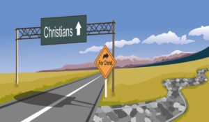 a broad road with a sign overhead reading "Christians" and then with a small turn off to the right reading "for christ"